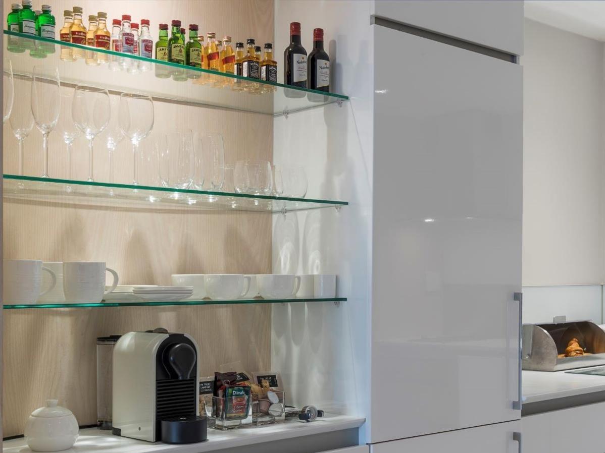 South Beach Camps Bay Boutique Hotel Fokváros Kültér fotó A kitchen with a Nespresso machine